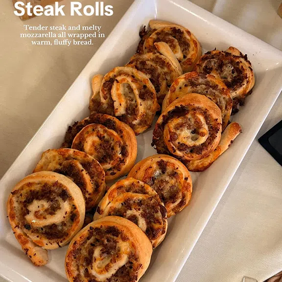 Baked steak rolls stuffed with mozzarella cheese